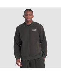 Nike - Gotham New York Jets 2025 Rivalries Collection Sideline Full-zip Bomber Jacket - Lyst