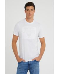 Guess - Embossed Logo T-shirt - Lyst
