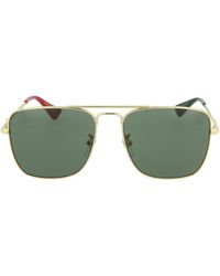 gold gucci glasses mens