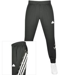 adidas Originals - Adidas Sportswear Three Stripes joggers - Lyst