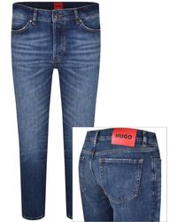 HUGO - 634 Tapered Fit Jeans Mid Wash - Lyst