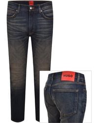 HUGO - 734 Extra Slim Jeans Mid Wash - Lyst
