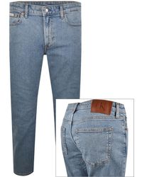 Calvin Klein - Slim Taper Jeans Light Wash - Lyst