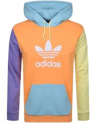 adidas originals hoodie with central trefoil and band logo in navy