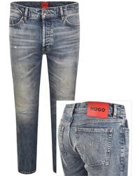 HUGO - 634 Tapered Fit Jeans Mid Wash - Lyst