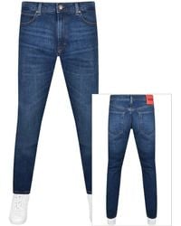 HUGO - 708 Slim Fit Mid Wash Jeans - Lyst