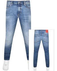 HUGO - 708 Slim Fit Mid Wash Jeans - Lyst