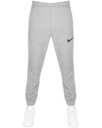 Nike - Training Tapered jogging Bottoms - Lyst