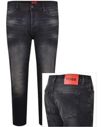 HUGO - 634 Tapered Fit Jeans Dark Wash - Lyst