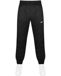 Nike - Therma Fit Tapered joggers - Lyst