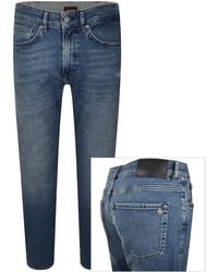 BOSS - Boss Onyx Slim Tapered Fit Mid Wash Jeans - Lyst