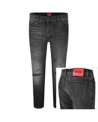 HUGO - 634 Tapered Fit Jeans Mid Wash - Lyst