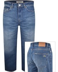 Lacoste - Straight Fit Mid Wash Jeans - Lyst