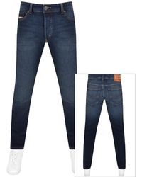 DIESEL Buster Regular Slim Tapered Fit Jeans In 084as Mid Wash in Blue for  Men | Lyst