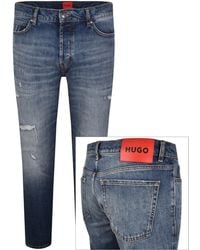 HUGO - 634 Tapered Fit Jeans Mid Wash - Lyst