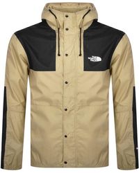 The North Face Seasonal Mountain water repellent jacket in khaki and black  - Exclusive at ASOS