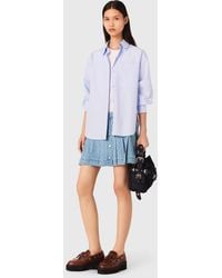 Maje - Plissee-Jeansrock Mit Strass - Lyst