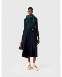 Maje - Long Pleated Skirt With Buckle - Lyst