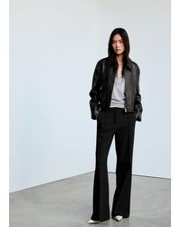 Mango - Flared Trousers With Seams - Lyst