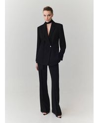Mango - Flared Trousers With Seams - Lyst