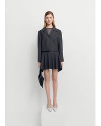 Mango - Wool Mini-skirt With Asymmetrical Hem - Lyst