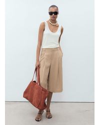 Mango - Lyocell Pleated Bermuda Shorts - Lyst