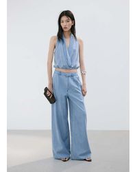 Mango - Wideleg Lyocell Trousers - Lyst
