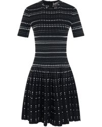 Alexander McQueen - Ribbed Flared-hem Knitted Mini Dres - Lyst