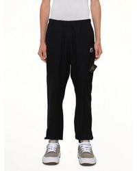 Undercover - X Champion Sweatpants - Lyst