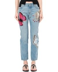 McQueen - Denim Pants With Print - Lyst