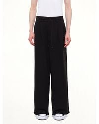 DSM KEI NINOMIYA - Pile Knit Pleated Pants - Lyst