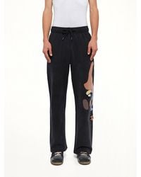 Kidsuper - Side Eye Face Sweatpants - Lyst