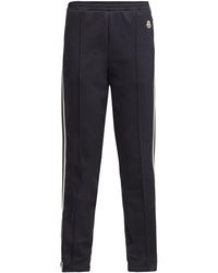 Moncler Pantalon de jogging technique à bandes latérales - Bleu