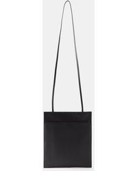 Slouchy banana leather crossbody bag The Row Black in Leather - 35871043