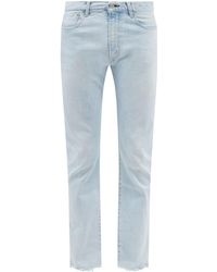 Kuro Helvetica Slim-leg Jeans - Blue