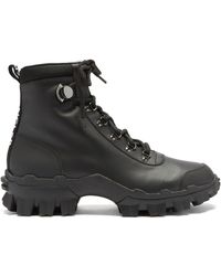 Moncler Bottes en cuir à semelle crantée Helis - Noir