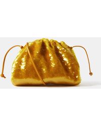 Bottega Veneta new metallic gold pouches #metallicleather Bottega Veneta  new small and large pouch in crinkled met…