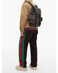gucci supreme black backpack