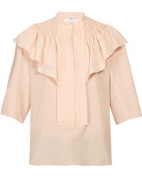 Chloé Blouse en crêpe à épaules volantées et smocks - Rose