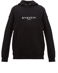Givenchy Sweat-shirt en coton à capuche et imprimé logo - Noir