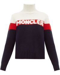 Moncler Pull rayé en laine mélangée à jacquard logo - Bleu