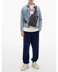 gucci supreme man bag