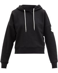Moncler Sweat-shirt en jersey de coton à capuche et logo - Noir