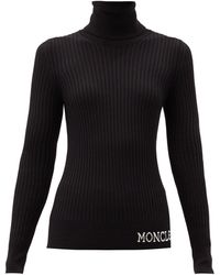 Moncler Pull col roulé en laine à logo en intarsia - Noir