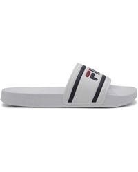 fila white slip on