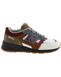 new balance 711 camoscio