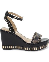 Sandali con plateau Guess da donna - Fino al 48% di sconto | Lyst