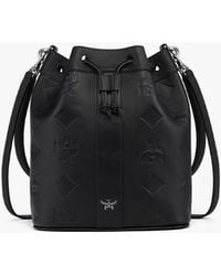 MCM - Dessau Drawstring Bag In Maxi Monogram Leather - Lyst