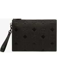MCM - Aren Wristlet Zip Pouch In Maxi Monogram Leather - Lyst