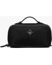 MCM - Ottomar Toiletry Bag In Econyl And Leather - Lyst